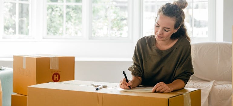 A woman going over how to choose the right moving company in Ottawa