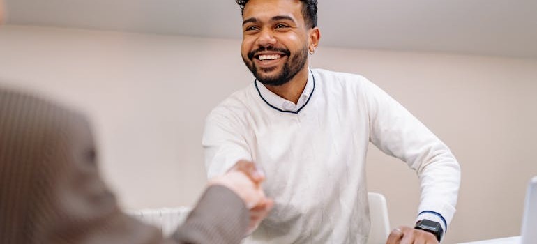 two people shaking hands
