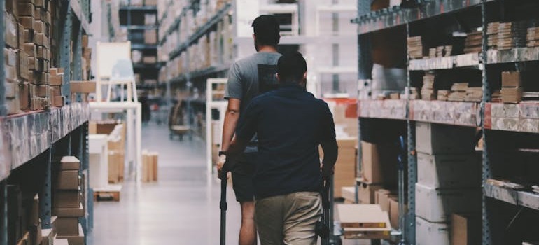 Two men inside a warehouse