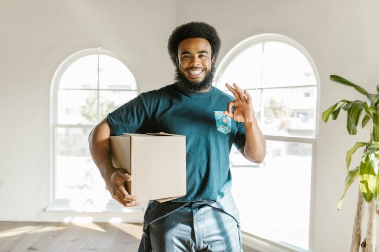 A mover holding a box