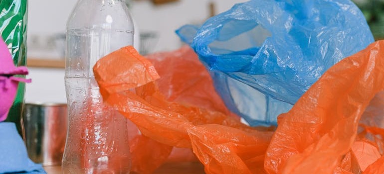 Plastic bags and bottles on a surface