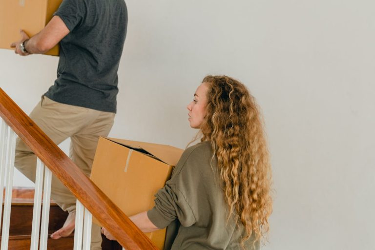 A couple entering a home after the move in Ontario during post-holiday blues