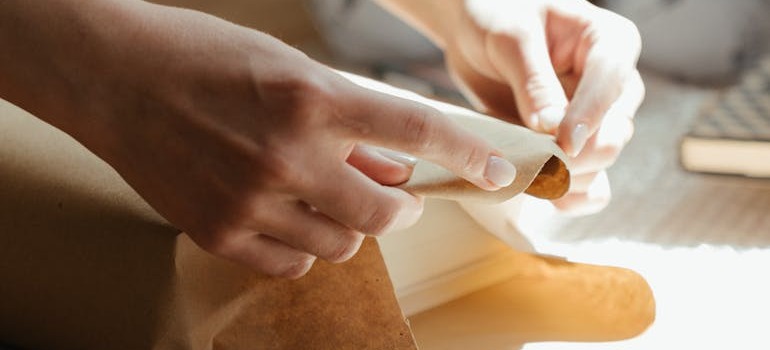 A person packing an item