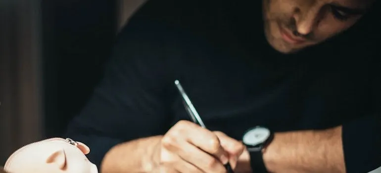 A man creating a budget
