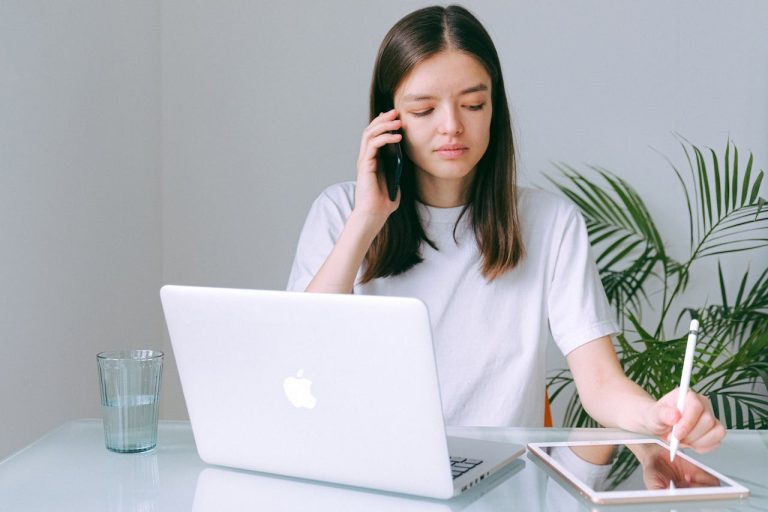 A woman learning about why January is the perfect time to book your spring move in Ottawa