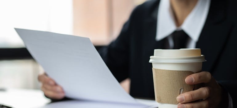 A woman reading and understanding moving insurance