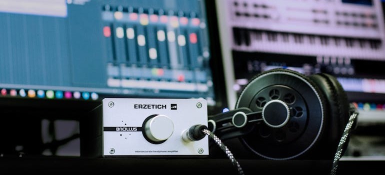 A headphone and amplifier inside a studio