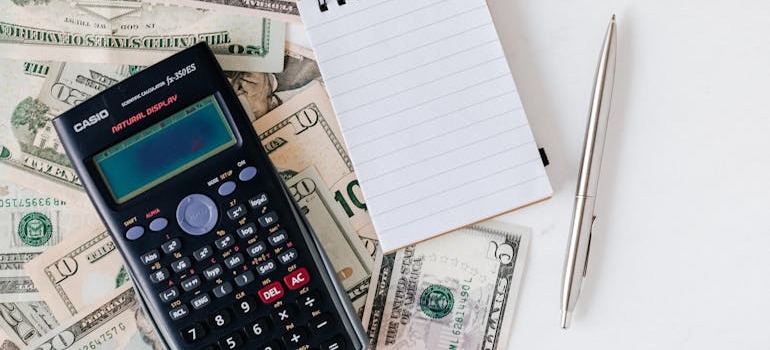 A calculator on top of money