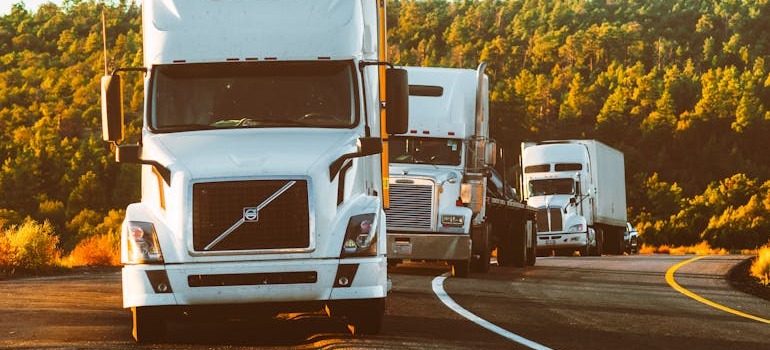 Several trucks on the road