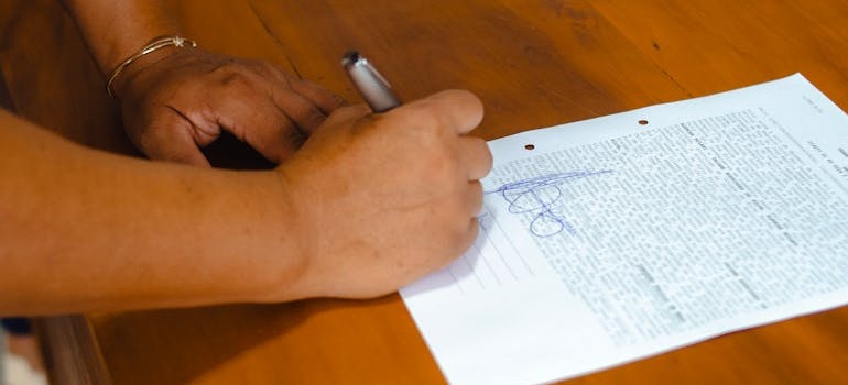 A person signing a document