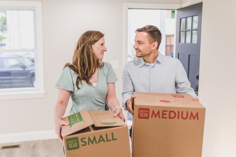 A couple getting ready for a move before hiring movers in Kanata for your small move