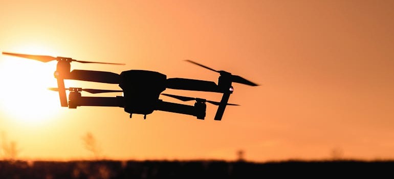A silhouette of a drone, whih is illustrating how smart technology is changing the way we relocate in Ottawa
