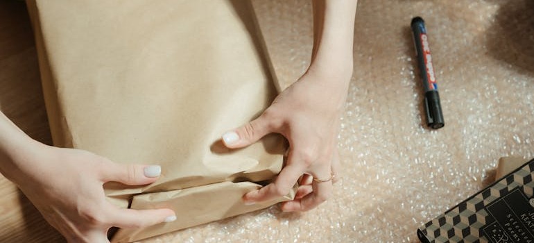 A person packing after facing moving date changes