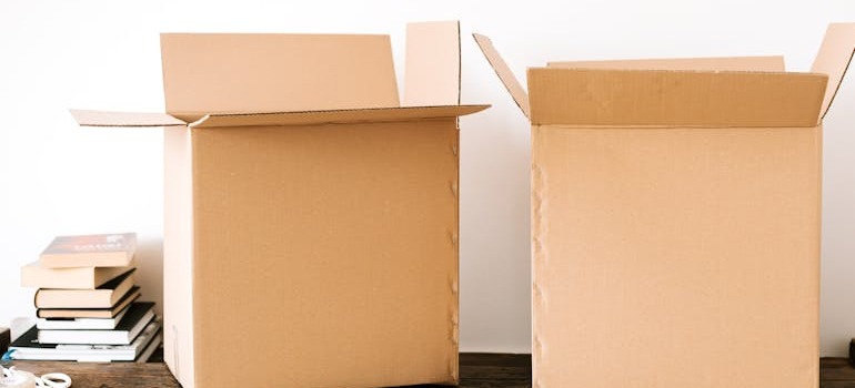 Two moving boxes on a table