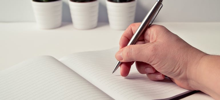 A person writing a plan