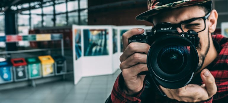 A photographer taking a picture at one of the best places in Ottawa for photographers