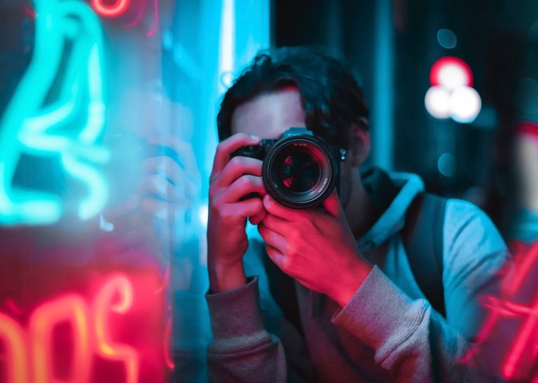 A photographer taking pictures at one of the best places in Ottawa for photographers