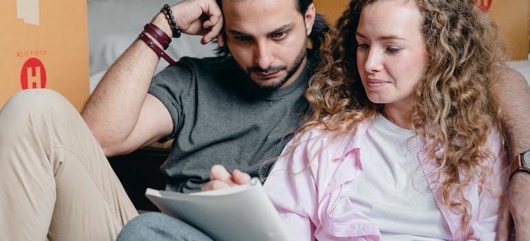 A couple creating a moving plan