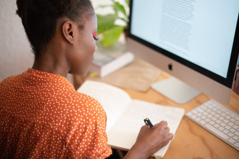 A woman learning about how to move your home office to Nepean