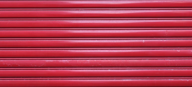 A red door of a storage unit