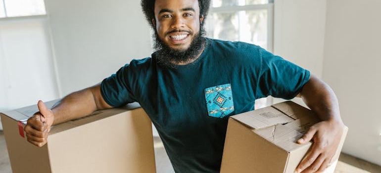 A mover surrounded by by moving boxes