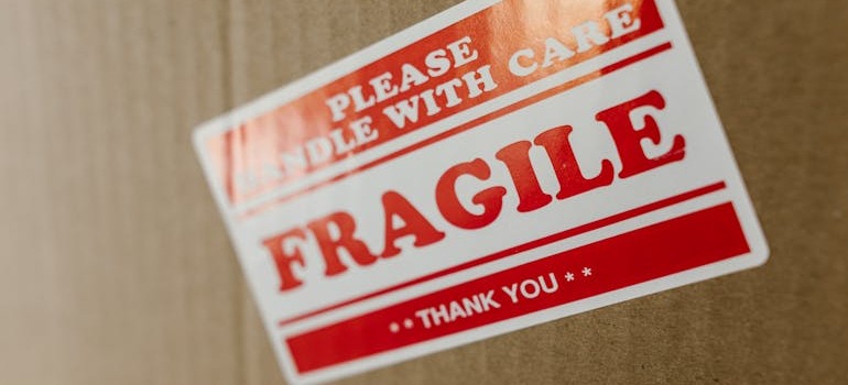 A moving box with a fragile label in it