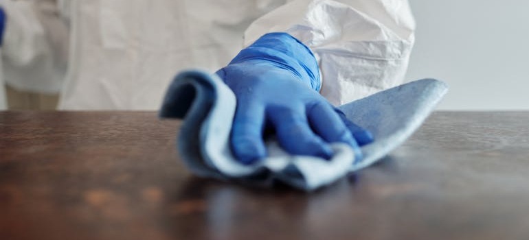 A person cleaning after coordinating an office move in Ottawa