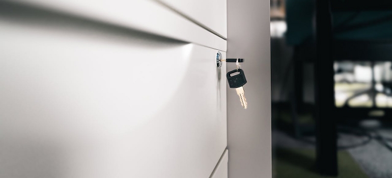 Storage locker with a key in the lock. 